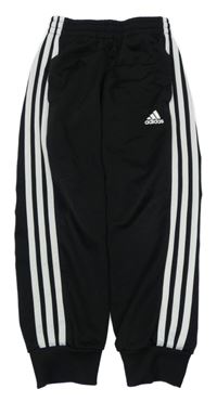 Černé sportovní tepláky s bílými pruhy a logem Adidas