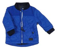 Modrá šusťáková jarní zateplená bunda Next