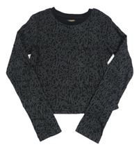 Čierne rebrované crop tričko s nápismi OVS