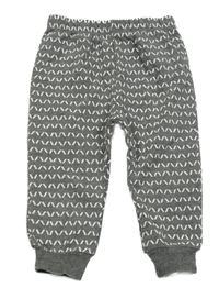 Béžové tepláky se vzorem 