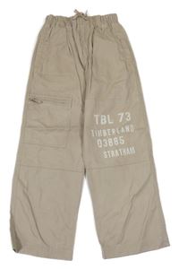 Béžové rifle s nápisem Timberland