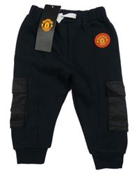 Nové - tmavomodré cargo fotbalové tepláky Manchester United