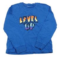 Modré triko s nápisem Next