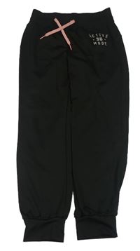 Černé sportovní tepláky s nápisem H&M