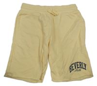 Vanilkové teplákové kraťasy s nápisom H&M