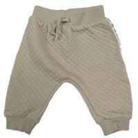 Béžové prošívané tepláky s pruhem s nápisy a medvědy George