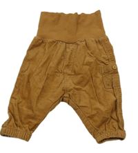 Hnědé manšestrové kalhoty s kapsou a úpletovým pasem H&M