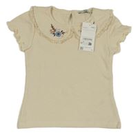 Nové - Smetanové vzorované tričko s límečkem a květy C&A