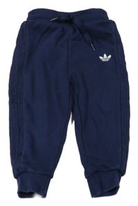 Tmavomodré tepláky s logom Adidas