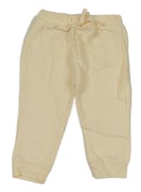 Vanilkové tepláky KIABI