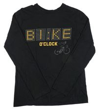 Černé triko s nápisy a kolem DESTINATION