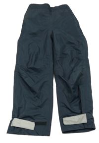 Tmavomodré šušťákové podšité nohavice s reflexními prvky tcm