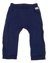 Tmavomodré baggy tepláky zn. H&M