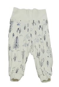 Biele tepláky so stromčekmi  a domečky a zvieratkami lupilu