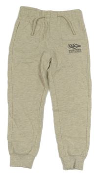 Béžové melírované tepláky s nápisem 