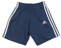 Tmavomodré teplákové kraťasy s logem Adidas