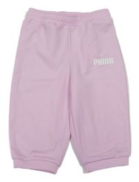 Světlerůžové sportovní tepláky s logem Puma