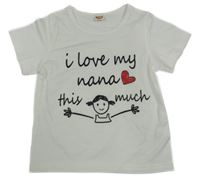 Biele tričko s nápismi a dievčatkom