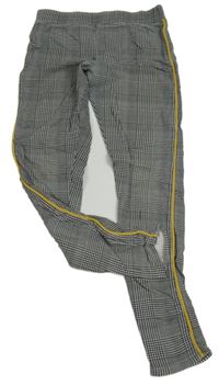 Čierno-bielo-horčicové kockované legíny s pruhmi zn. H&M