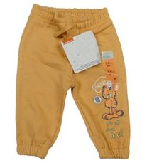 Nové - Oranžové tepláky s Garfieldem 