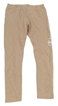 Pudrové teplákové legíny s logem Champion