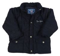 Tmavomodrá šušťáková zimná bunda s nápisom