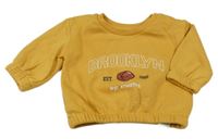 Okrová mikina s basketbalovým míčem Primark