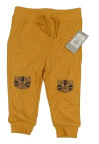 Nové - Okrové tepláky s medvědy Primark