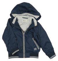 Tmavomodrá šušťáková jarná bunda s kapucňou H&M