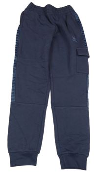 Tmavomodré tepláky s logom a vreckami Adidas