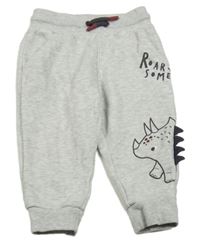 Světlešedé tepláky s dinem a nápisy Nutmeg