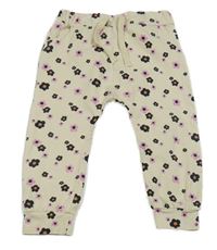 Béžové kytičkované tepláky Name it 