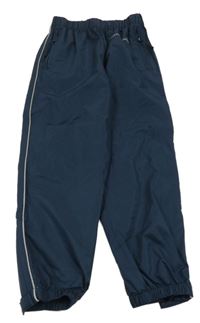 Tmavomodré šušťákové nepromokavé nohavice