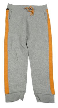 Šedé tepláky s oranžovým pruhem 