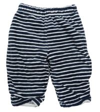 Tmavomodro-biele pruhované zamatové zateplené tepláky zn. C&A