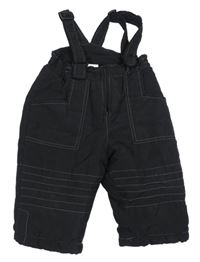 Černé šusťákové oteplovačky s trakami