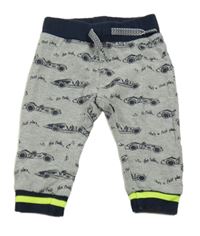 Sivé melírované tepláky s formulami Dirkje