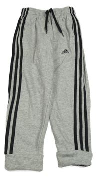 Šedé melírované tepláky s černými pruhy a logem Adidas