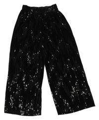 Čierne zamatové culottes flitrové nohavice Zara