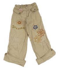 Béžové plátenné crop nohavice s vreckami s kvetmi