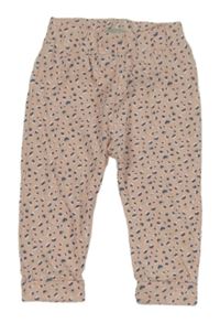 Pudrové vzorované tepláky