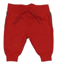 Červené tepláky s pruhom Primark