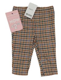 Nové - světlebéžovo-tehlovo-čierno-modré vzorované úpletové nohavice zn. Next