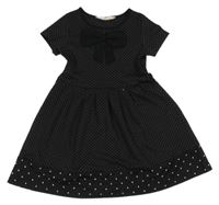 Čierno-biele bodkovaná é šaty s mašlou H&M