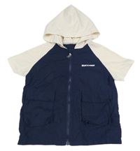 Tmavomodro-smotanová šušťáková vesta s nápisom a kapucňou