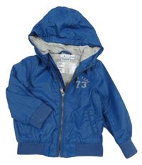 Tmavomodrá šusťáková jarní bunda s kapucí Impidimpi