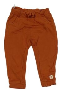 Skořicové tepláky s kvetinou C&A