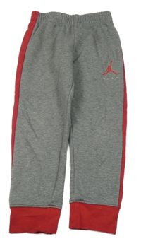 Šedo-červené tepláky s logem Nike Air Jordan