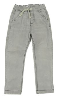 Svetlosivé rifle so smajlíkmi Tu