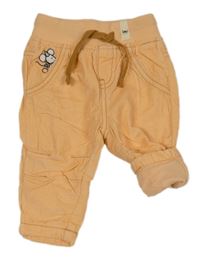 Svěleoranžové manšestrové podšité kalhoty s myškou a úpletovým pasem 